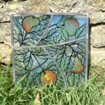 Handpainted stained glass decoration with Somerset scene