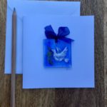 Blank greetings card with tiny fused glass dove suncatcher
