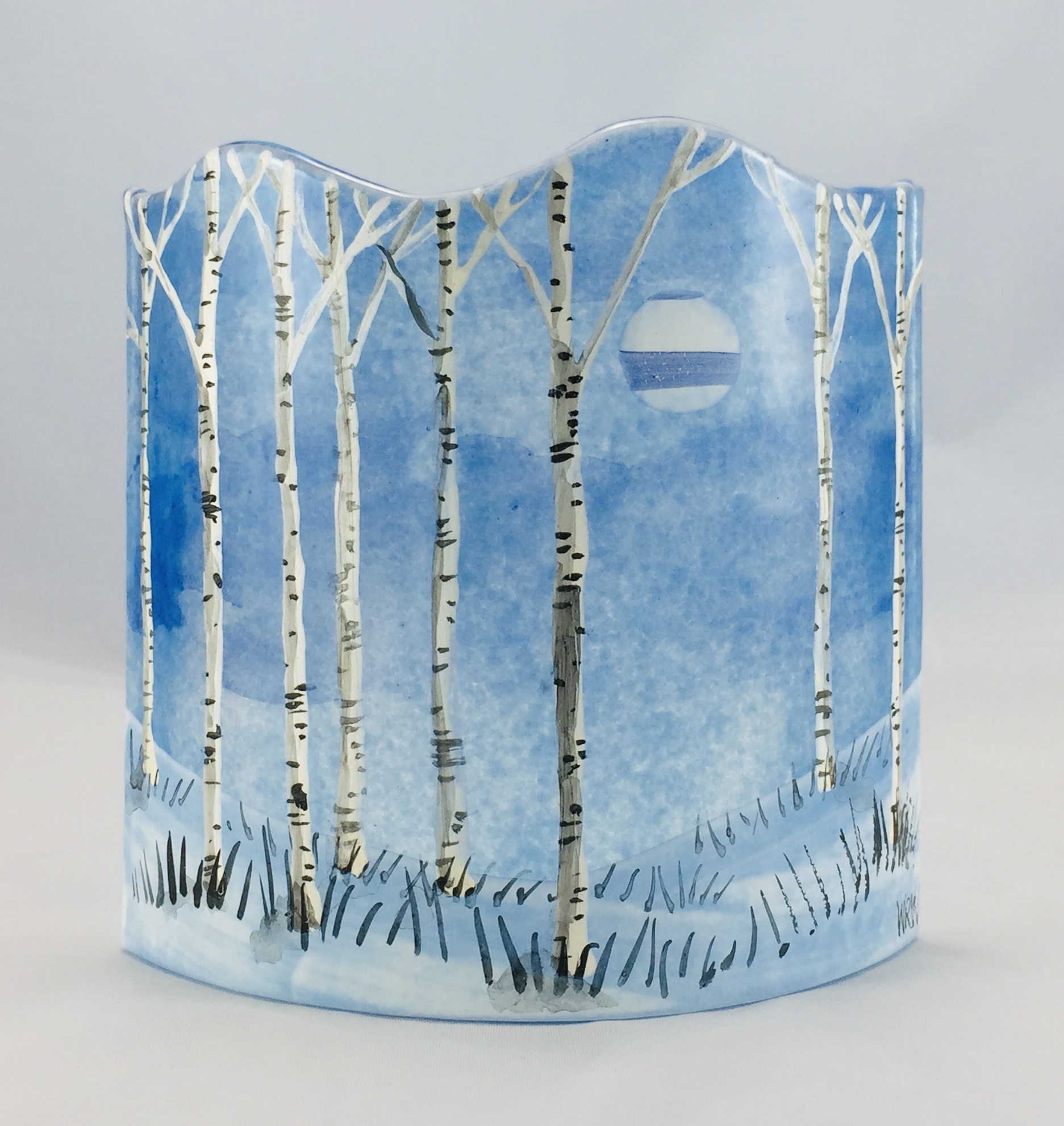 Blue fused glass curved panel of silver birches in moonlit snow scene