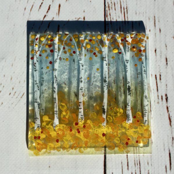 Fused glass coaster with autumnal birches