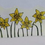 Front view of daffodils fused glass art