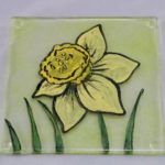 Fused glass coaster with handpainted daffodil design