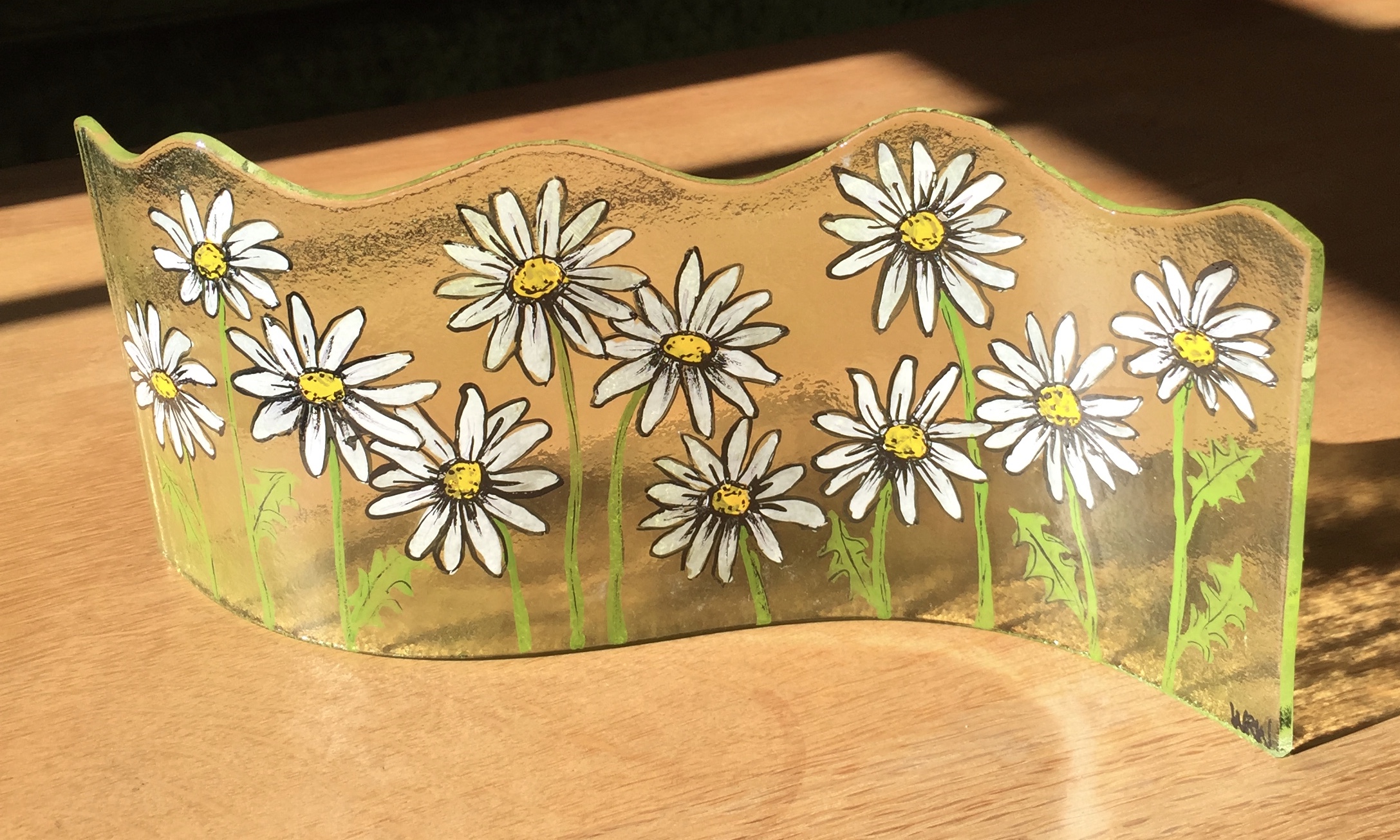 Long wavy fused glass panel with hand painted daisies