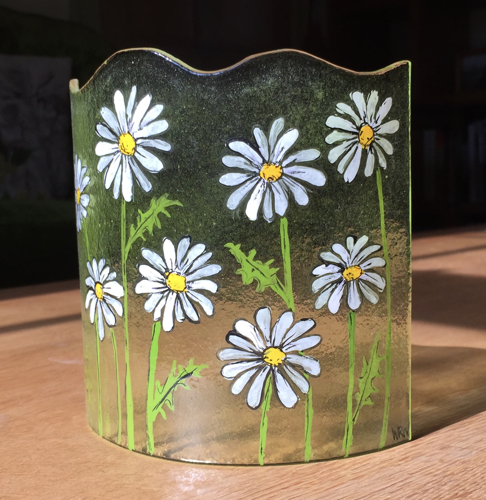 Curved fused glass panel with hand painted daisies