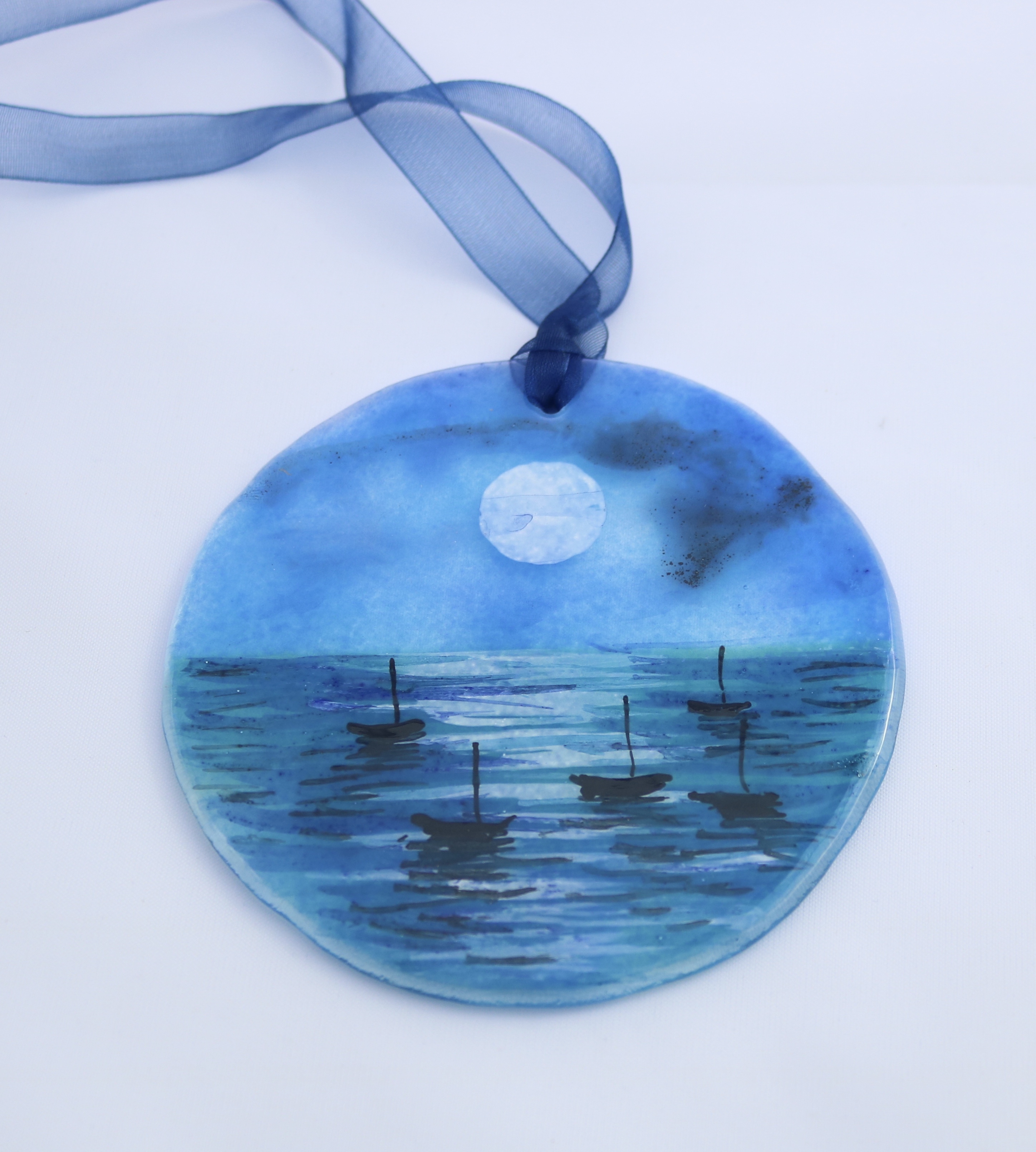 Handpainted seascape with moonlight and tiny silhouettes boats on glass