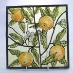 Leaded stained glass panel with sicilian oranges design
