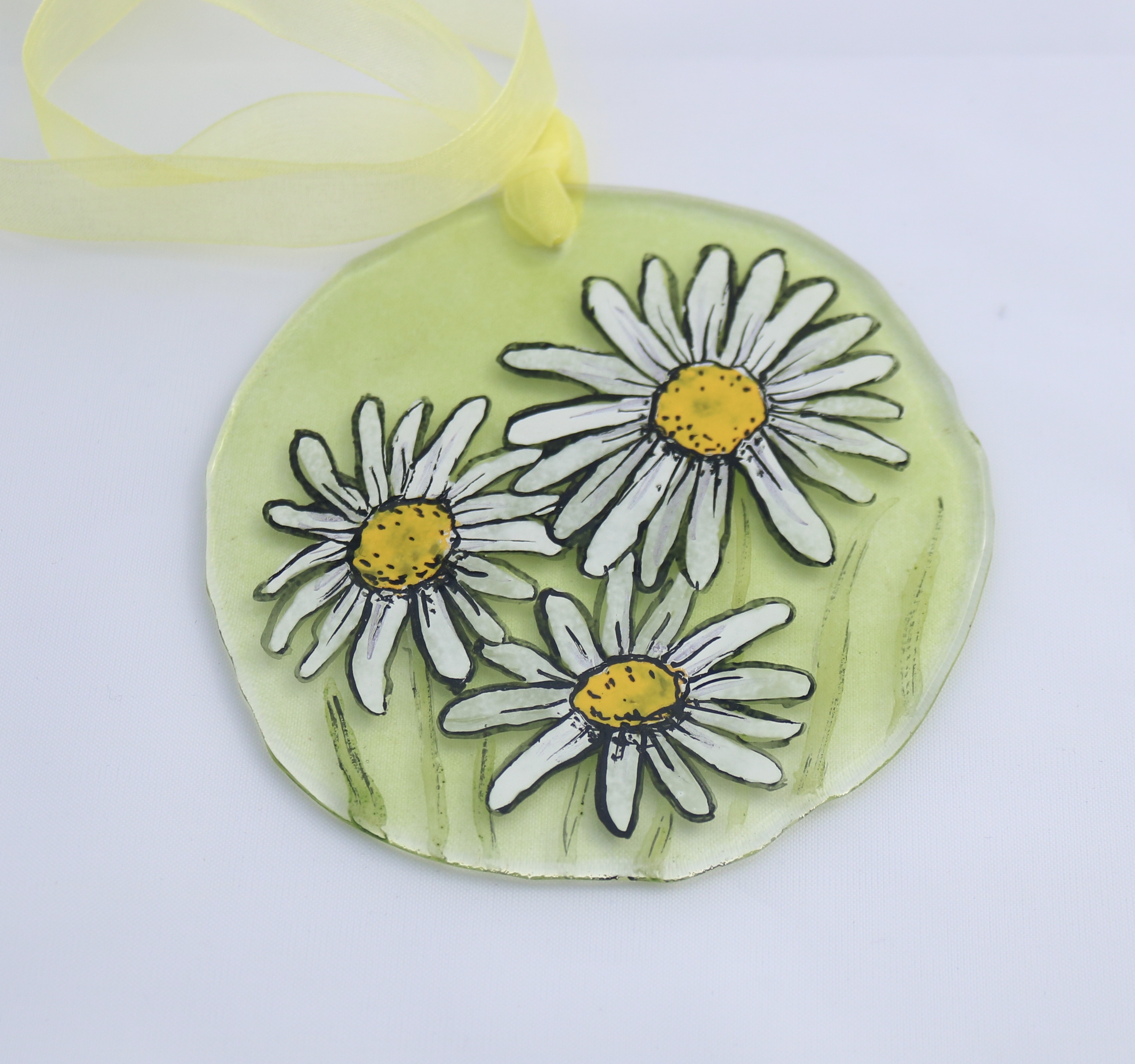 Handpainted daisies on round glass suncatcher