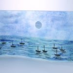 Curved glass decoration with handpainted ships at sea under moonlight