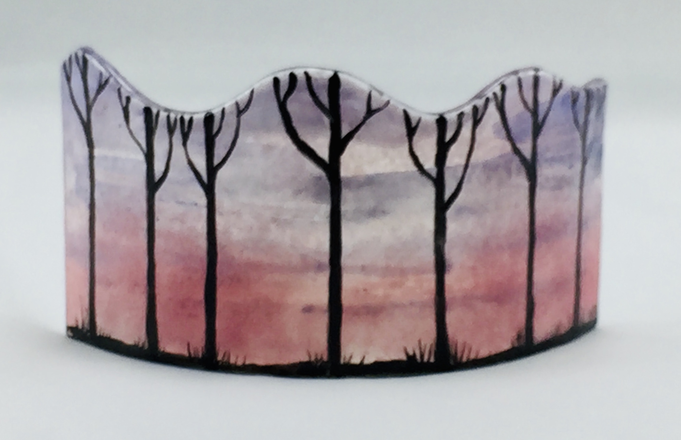 Fused glass mini panel with tree silhouettes on pinkish sunset background