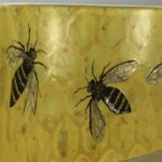 Close up of wavy bee fused glass panel showing design detail